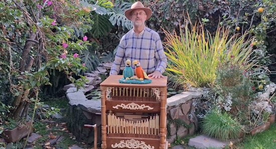 A MIDI controlled acoustic crank organ